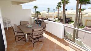 Outdoor dining - Spectacular 2 Bedroom Condo on Sandy Beach at Las Palmas Resort B-201 1 Condo by RedAwning (Puerto Peñasco)