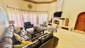 Villa, 3 Bedrooms | Living area - Stunning 3 Bedroom Beach Villa on Sandy Beach at Las Palmas Beachfront Resort V4 3 Villa by RedAwning (Puerto Peñasco)