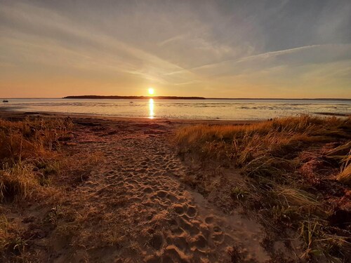 Seconds to the beach, our coastal farmhouse themed family cottage