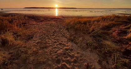 Seconds to the beach, our coastal farmhouse themed family cottage