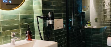 Shower, eco-friendly toiletries, hair dryer, bidet
