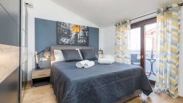 1 slaapkamer, een strijkplank/strijkijzer, gratis wifi, beddengoed