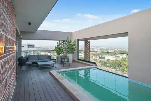 Outdoor pool - Tower Rialto | A Cozy Getaway (Santiago De Los Caballeros)