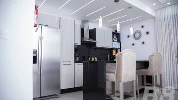Fridge, microwave, toaster, cookware/dishes/utensils