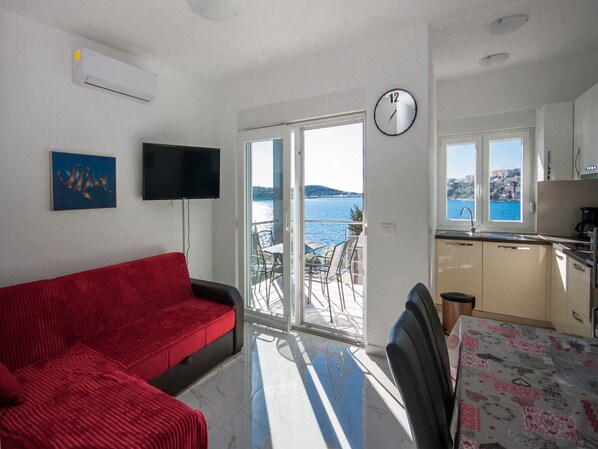 Apartment (One Bedroom Apartment with Balcony) | Living room | TV - Apartments Happy Holiday (Rogoznica)