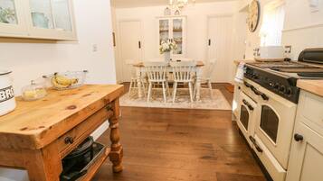 Fridge, electric kettle, toaster, cookware/dishes/utensils