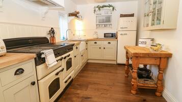 Fridge, electric kettle, toaster, cookware/dishes/utensils