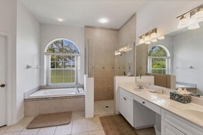 Shower, jetted tub, hair dryer, towels