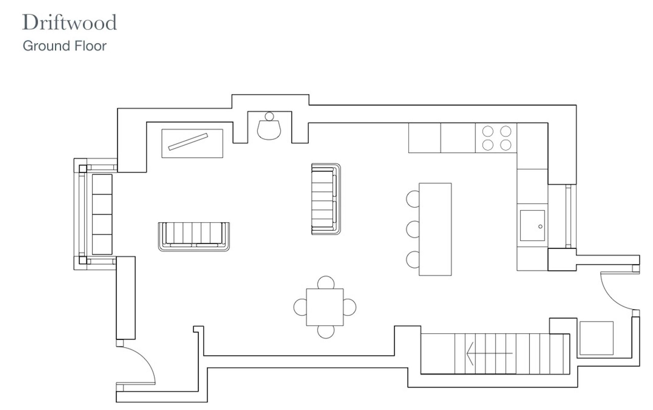 A ground floor layout of a Driftwood hotel with a dining area, kitchen, and a seating area with a table and chairs.