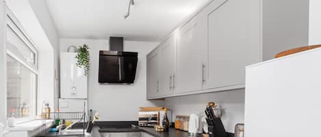 Fridge, microwave, oven, coffee/tea maker