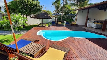 2 outdoor pools, open 9:00 AM to 9:00 PM, pool umbrellas, pool loungers