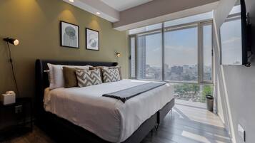 Departamento Deluxe, 2 habitaciones, vista a la ciudad | Ropa de cama de alta calidad y edredón
