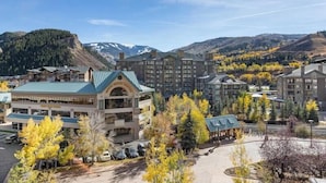 A hotel with a central building, multiple smaller structures, and a parking area. - Club Wyndham Resort at Avon (Avon)