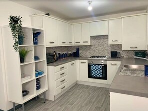 Full-sized fridge, microwave, oven, dishwasher