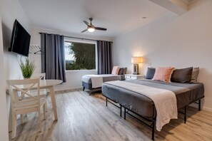 1 bedroom, desk, iron/ironing board, travel cot