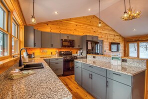 Fridge, microwave, oven, stovetop - Timber Overlook - New construction log cabin with views of Rangeley Lake! (Rangeley)