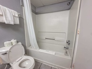 Combined shower/tub, hair dryer, towels, shampoo