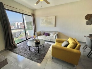 condesa 11 | Living area | 50-inch plasma TV with digital channels, TV - Condesa Apartments (Mazatlán)