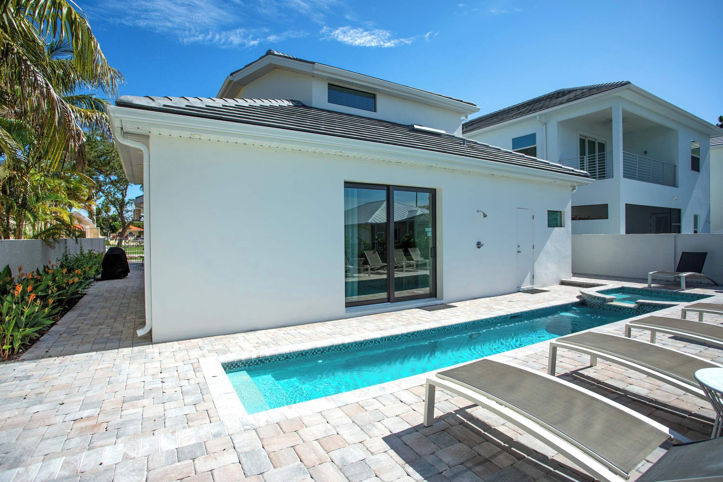 Private Pool and Hot Tub ; Ample Seating; Private Grill; Privacy Fence; Southern Exposure!