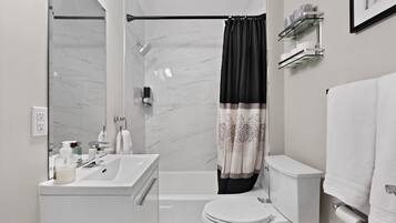Hair dryer, towels, soap, shampoo