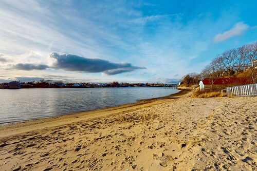 Inviting home + apartment near beach with furnished deck, yard, & grill