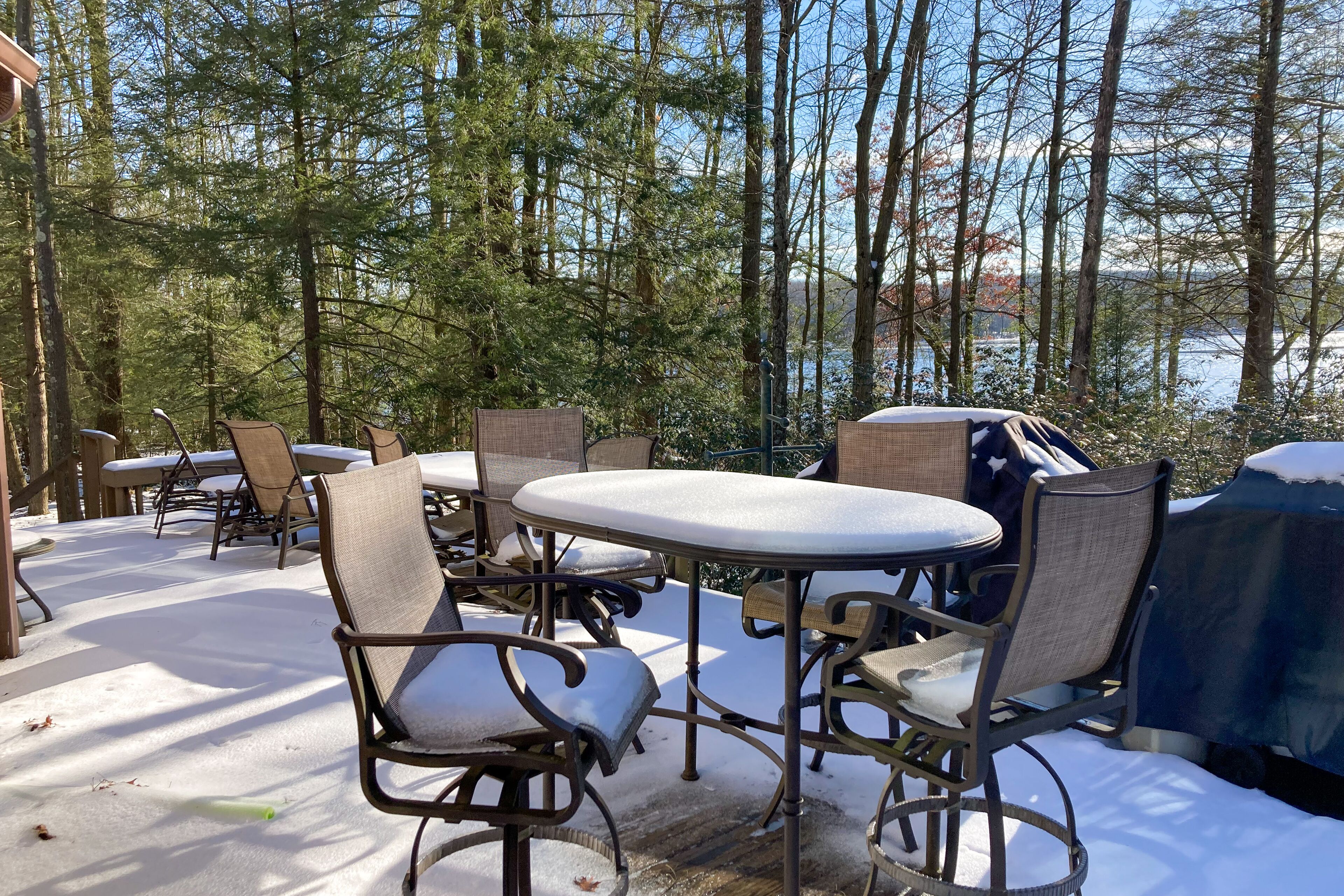 Enchanting waterfront home with hot tub, game room, fireplace, & washer/dryer