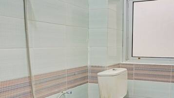 Standard Double Room | Bathroom | Shower, rainfall showerhead, toilet paper