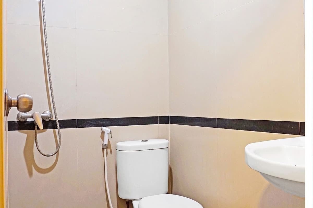 shower, rainfall showerhead, towels, toilet paper