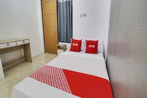Deluxe tweepersoonskamer | Een bureau, een laptopwerkplek, gratis wifi, beddengoed