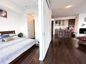 Deluxe Condo, Multiple Beds, Lake View | Living area | 50-inch Smart TV with satellite channels, Netflix, streaming services - Luxury 2 Bedroom Lakeview (Toronto)