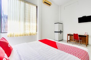 Habitación doble Deluxe | Ropa de cama