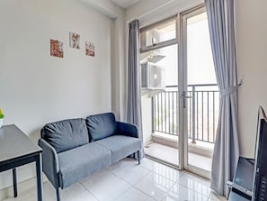 Habitació doble Deluxe | Escriptori i roba de llit 