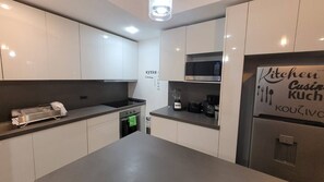 Fridge, microwave, oven, stovetop