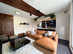 Signature Apartment | Living area | Flat-screen TV