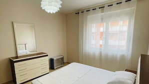 Apartamento familiar, 1 habitación, balcón, vistas al jardín
