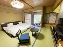 Tabla de planchar con plancha, wifi gratis y ropa de cama 