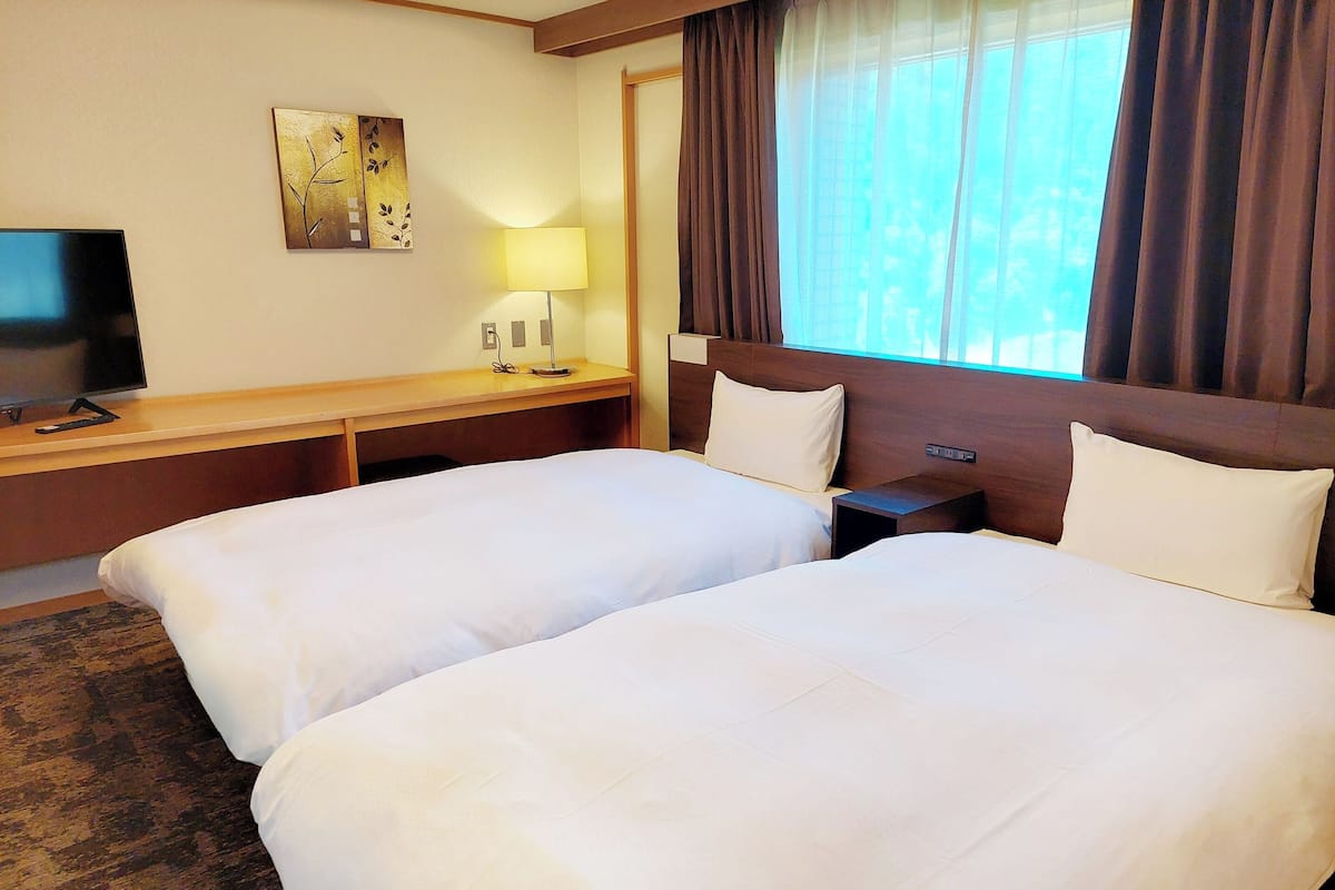 ห้องดีลักซ์ทวิน, ปลอดบุหรี่ | เตารีด/โต๊ะรีดผ้า, Wi-Fi ฟรี, ผ้าปูที่นอน