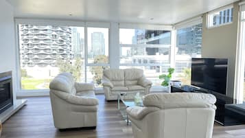 Premium Penthouse | Living area | Computer monitors, printers