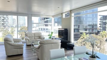 Premium Penthouse | Living area | Computer monitors, printers