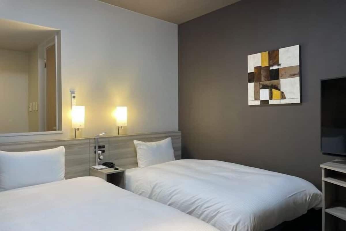 Desk, iron/ironing board, free WiFi, bed sheets