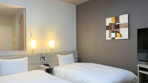 A hotel room with two beds, a nightstand with a lamp, a wall-mounted TV, and a painting. - Hotel Route Inn Shikoku Chuo - Mishimaka (Shikokuchuo)
