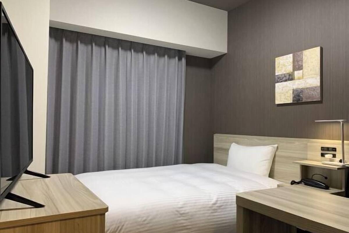 Desk, iron/ironing board, free WiFi, bed sheets