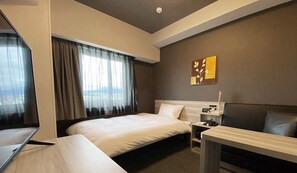 Standaard eenpersoonskamer, roken | Een bureau, een strijkplank/strijkijzer, gratis wifi, beddengoed