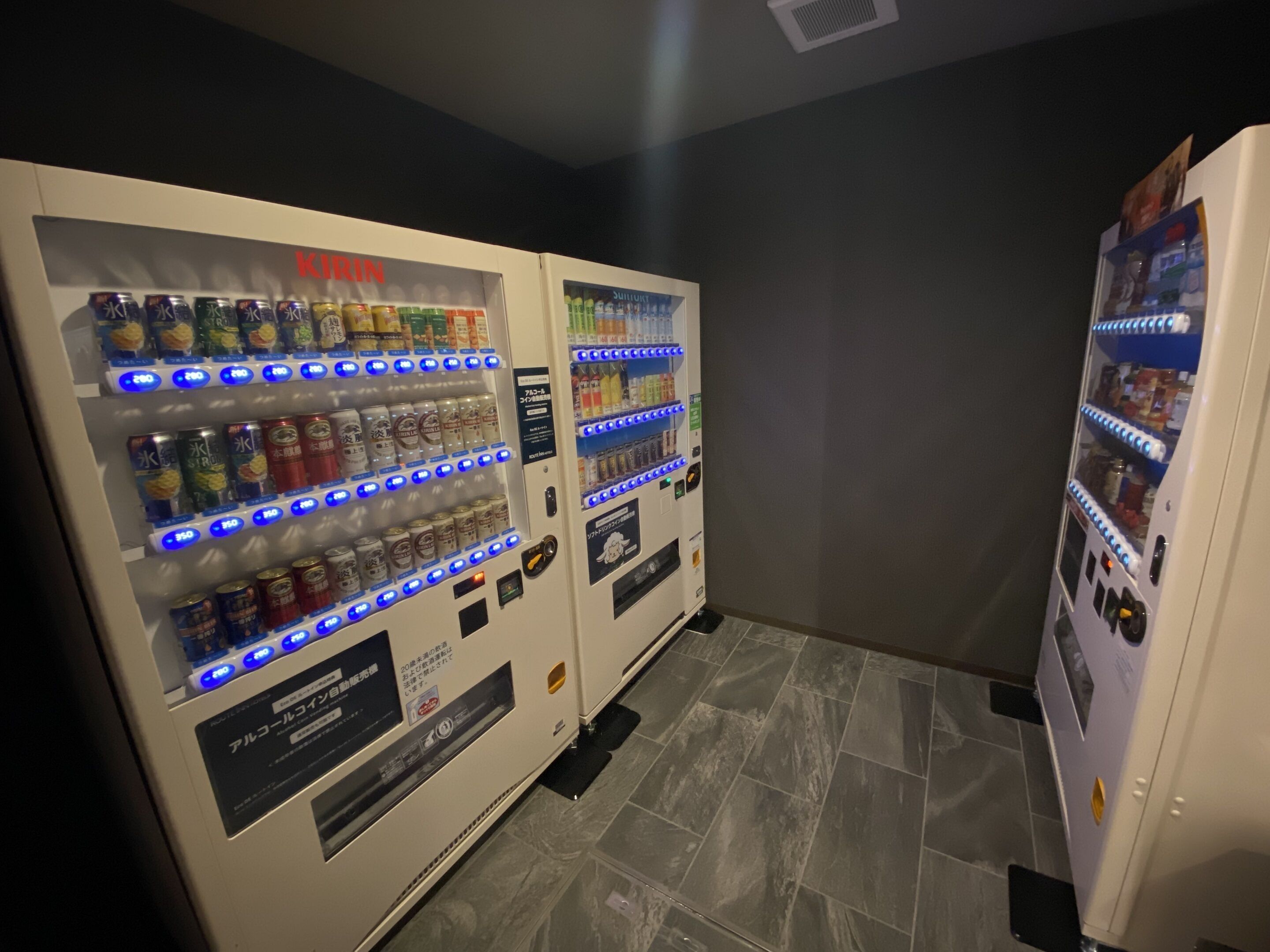Two vending machines with various beverages and snacks.