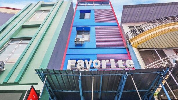 A multi-story building with a prominent 'Favorite' sign.