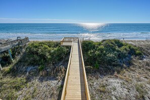 Walk along the boardwalk to the ocean's edge.