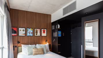 Premium bedding, pillowtop beds, laptop workspace, iron/ironing board