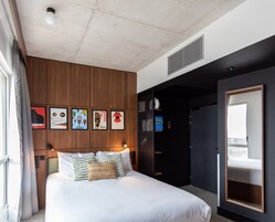 Premium bedding, pillowtop beds, laptop workspace, iron/ironing board