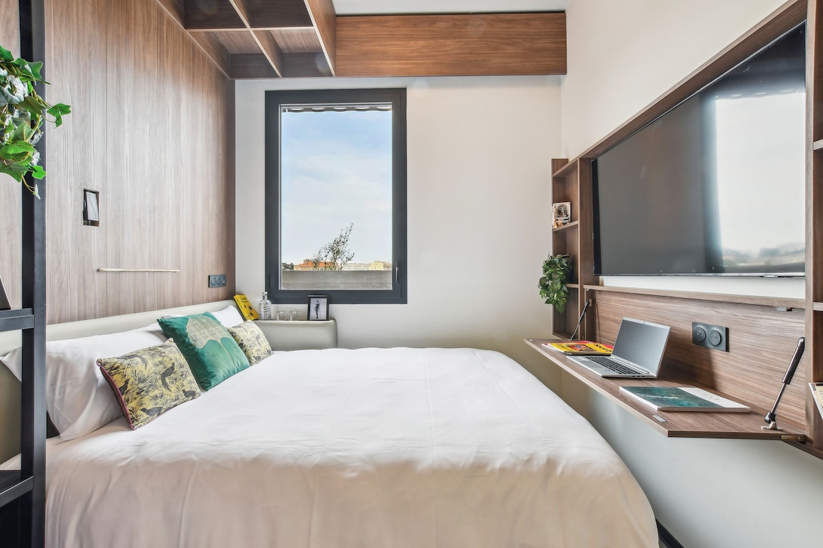 Premium bedding, pillowtop beds, laptop workspace, iron/ironing board