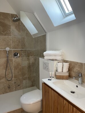 Hair dryer, towels, soap, shampoo